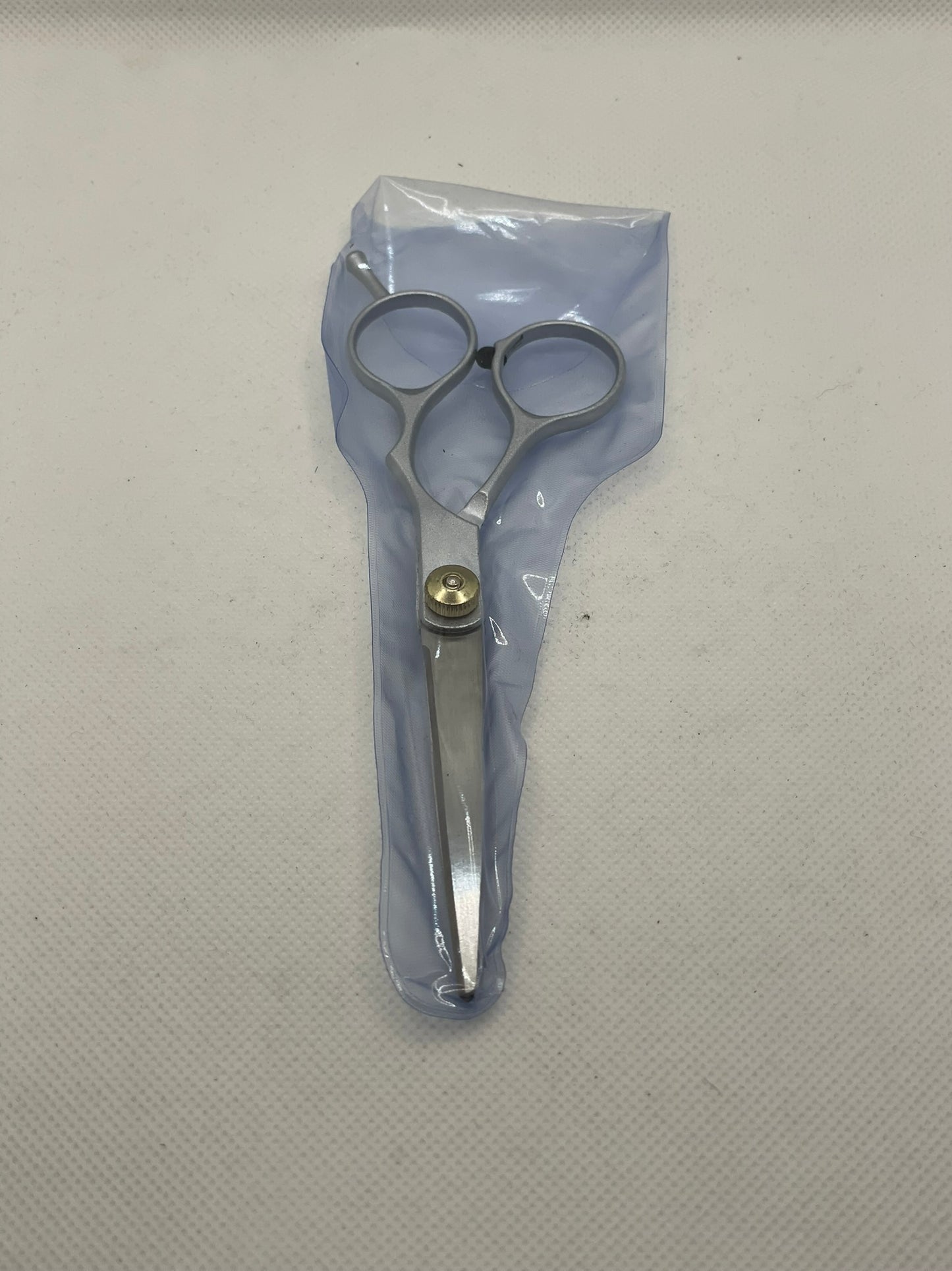 Tijeras de acero consagradas para uso ritual.